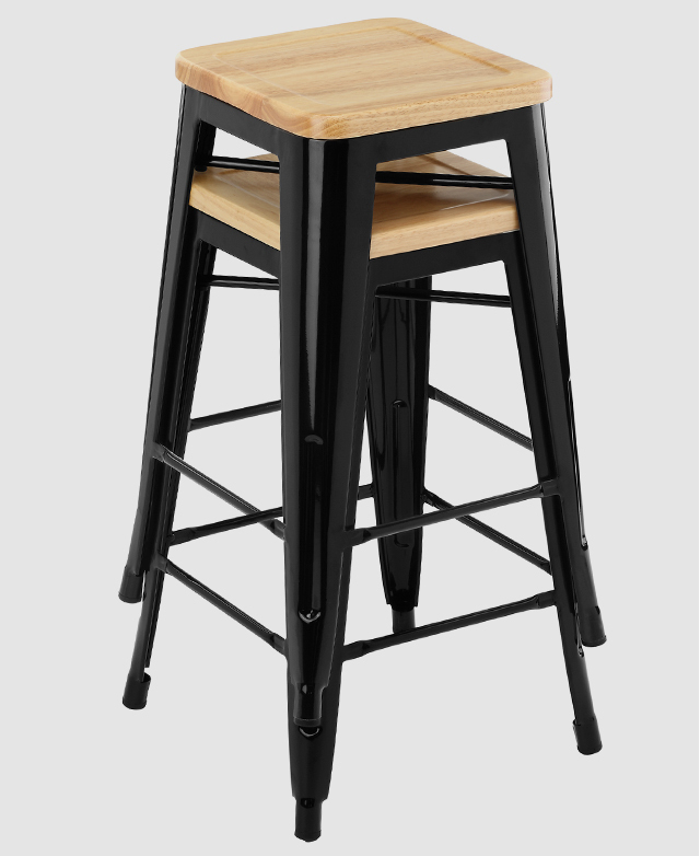 Two bar stools are neatly stacked on top of one another.