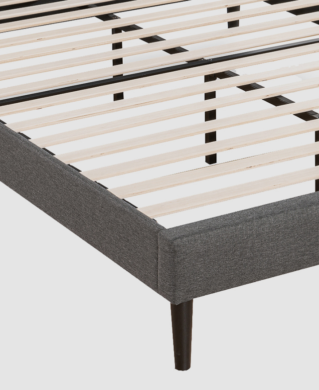 Flat timber slats are dispersed evenly across the base and secured to either end of the bed frame. Flat timber slats are dispersed evenly across the base and secured to either end of the bed frame.