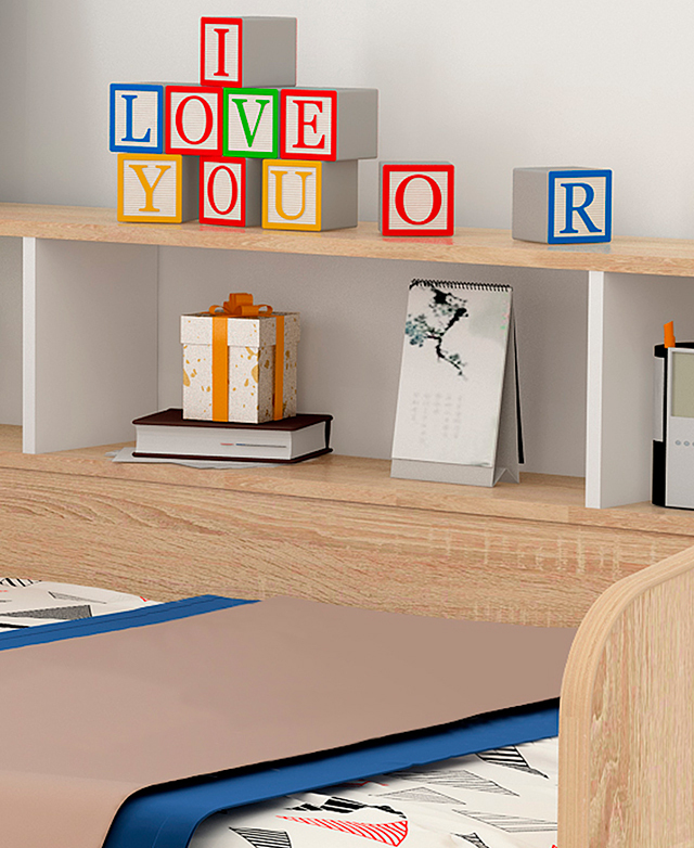 The shelves built-in to one side of the bed frame are personalised with bright and colourful decor.