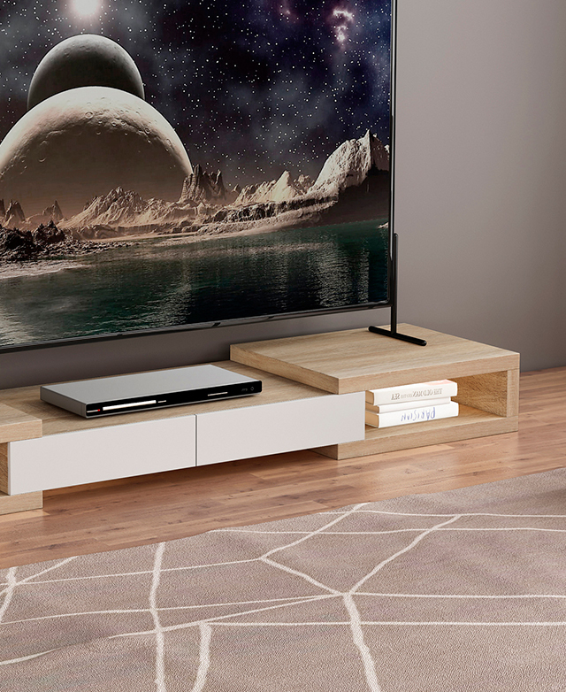 Cropped half-view of a TV unit. Two drawers form the centre of the unit; books are stored in the open shelf at one end. Cropped half-view of a TV unit. Two drawers form the centre of the unit; books are stored in the open shelf at one end.