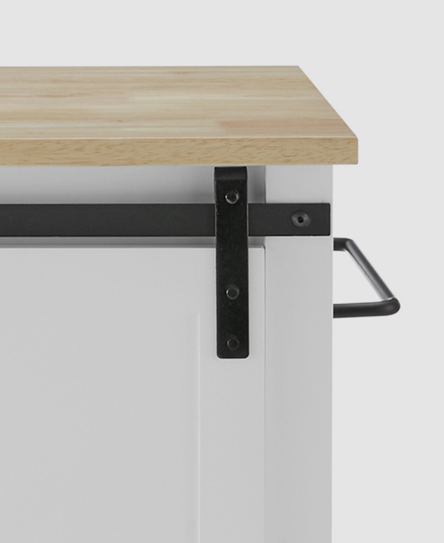 Cropped view of the top of the kitchen island bench, highlighting the powder-coated black metal accents.