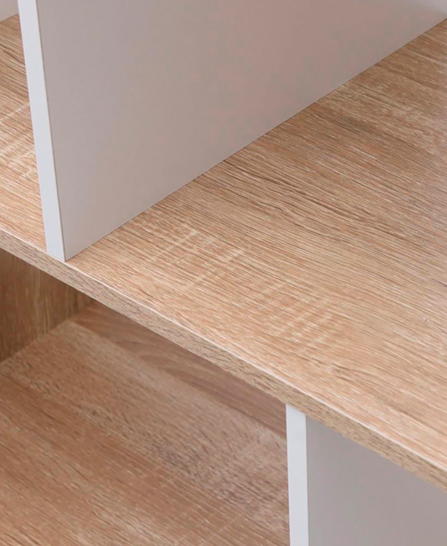 A close crop shows the grain detail of the shelf in a blonde colour, with contrasting white vertical partitions. A close crop shows the grain detail of the shelf in a blonde colour, with contrasting white vertical partitions.