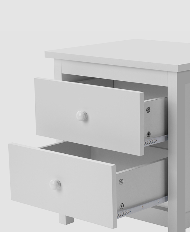 From a three-quarter angle, the bedside table shows its two drawers open in a staggered formation.