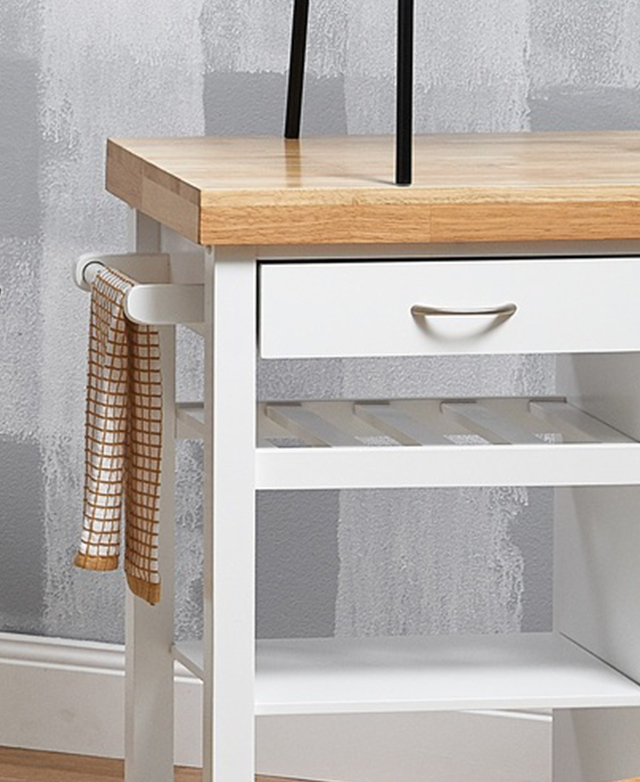 A corner view of the kitchen trolley shows a white finish on the frame and a rubberwood table top.