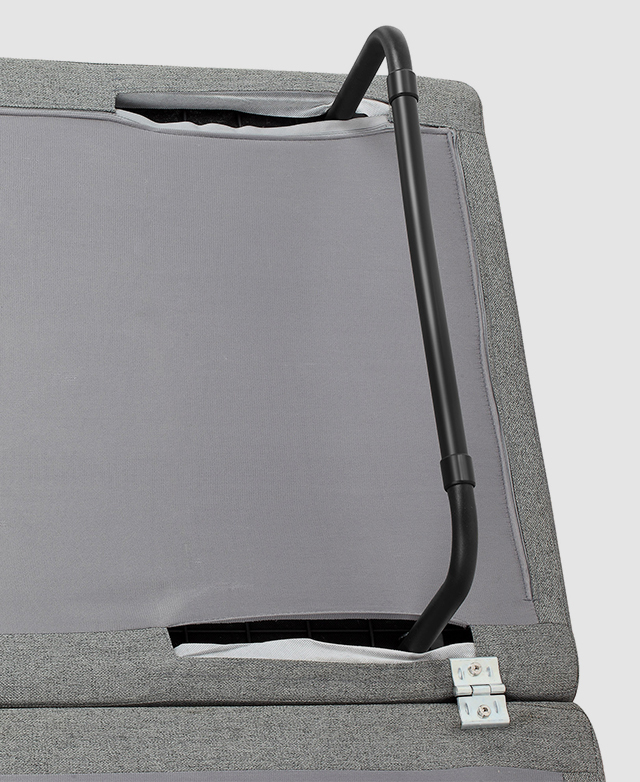The underside of one section presents a metal tube leg that has been brought out of the zip compartment. The underside of one section presents a metal tube leg that has been brought out of the zip compartment.