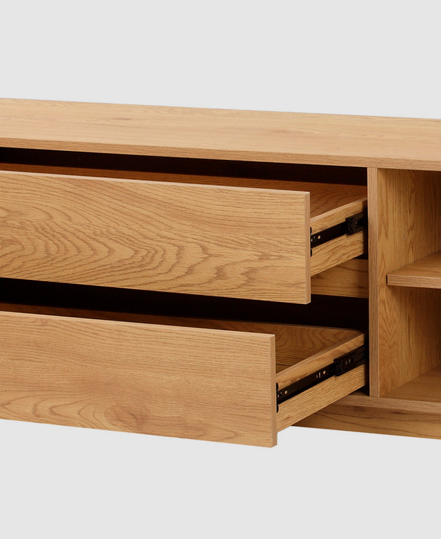 Both drawers, one above the other, are open, and the black metal runners are on display.