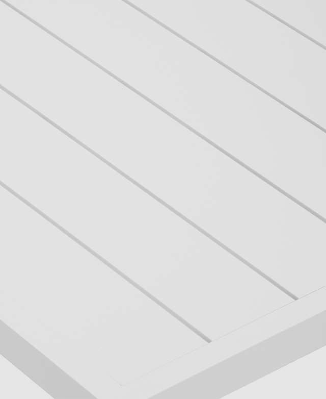 The slatted top of the coffee table with gaps in between the aluminium panels for easy drainage.