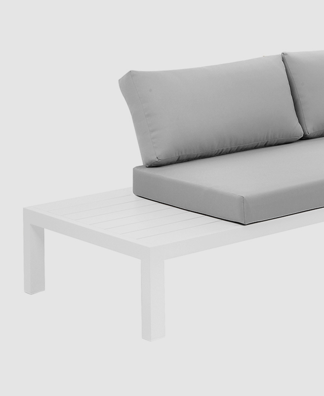 The end of a double lounge is shown. The base frame extends out, providing additional bench space next to the seat cushion.