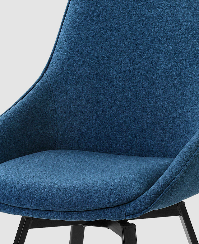 The cropped image's focus is the rounded seat and its cushioning. The cropped image's focus is the rounded seat and its cushioning.