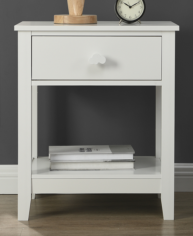The small bedside table has a top drawer and open bottom shelf.