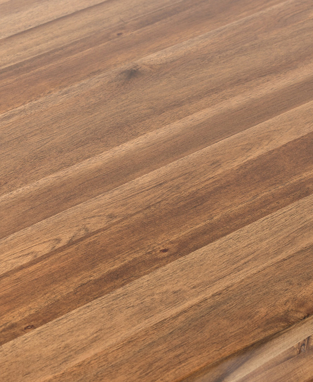 The close up of the acacia wood clearly displays the rich, varied tones and the natural grains.