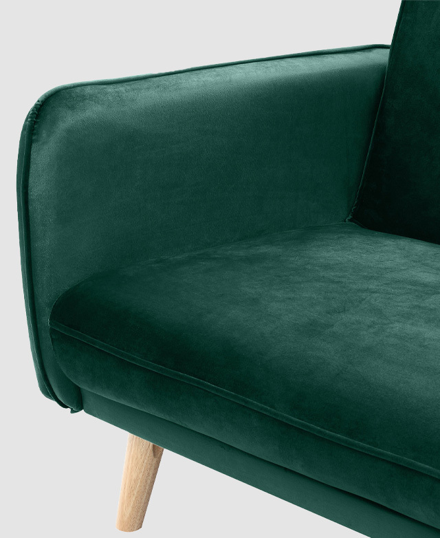 The velvet upholstery is shown close up, highlighting its soft, tactile quality.