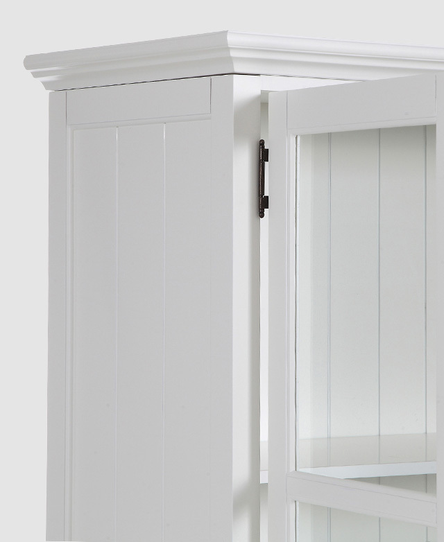 The bevelling around the top and the panelled design of the surfaces are shown. One black hinge is in the shot.