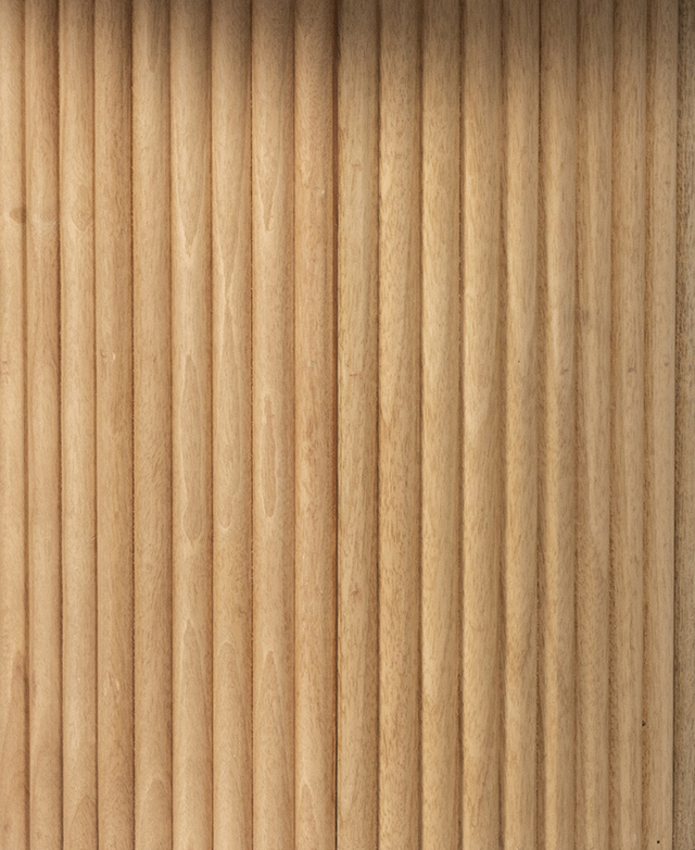 Close-up of the fluted detail on the mango wood pedestal base. A series of shallow grooves creates the fluting texture.