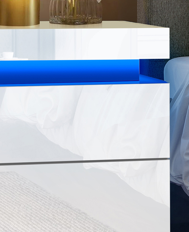 Corner view of the bedside table illustrates its high gloss melamine finish. Corner view of the bedside table illustrates its high gloss melamine finish.