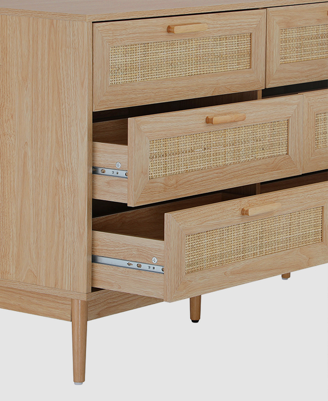 The three-quarter angle displays two open drawers with visible metal runners.