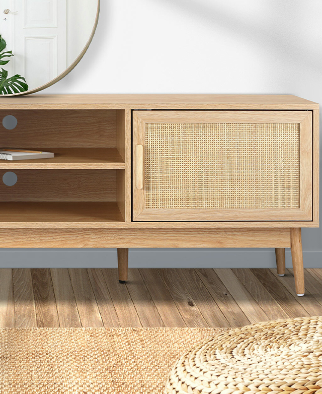 The cropped image focusses on a cupboard door and the two open shelves.