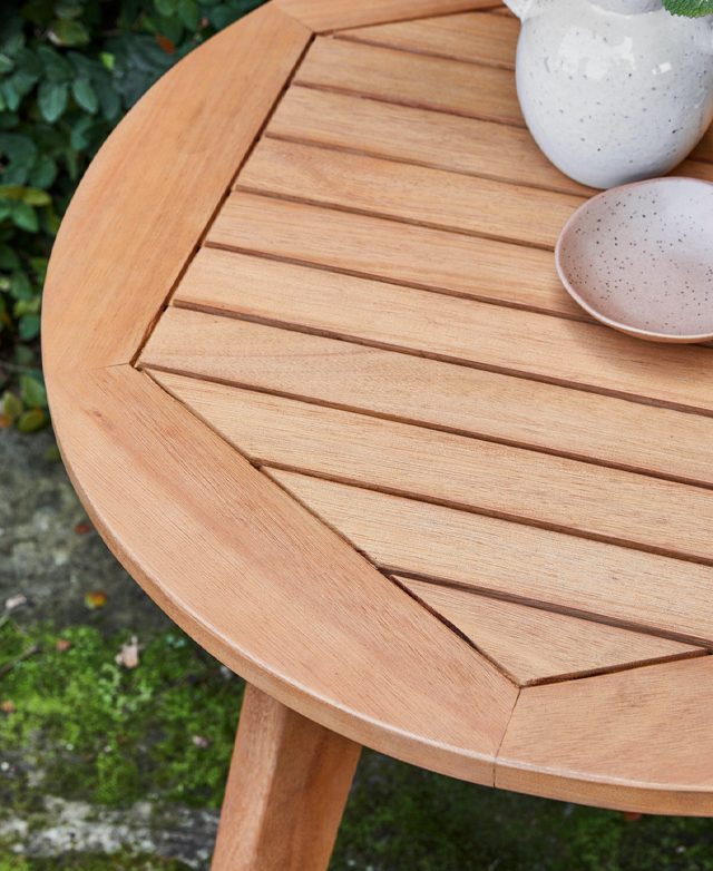 round wooden garden table