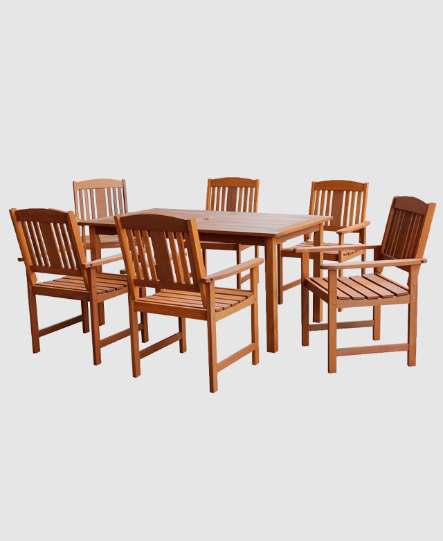 A seven-piece solid timber outdoor dining table and chair set made of shorea wood.