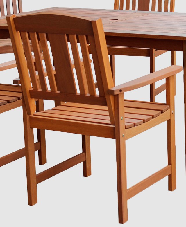 A shorea wood outdoor dining chair with sturdy armrests and a mid-height, angled backrest.