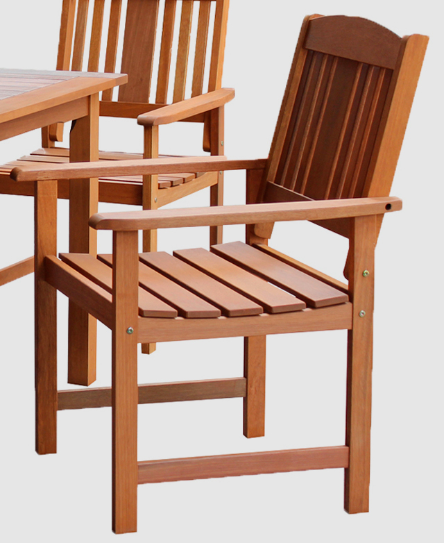 Side profile of a timber outdoor dining chair. The slatted seat is slightly curved for comfort.