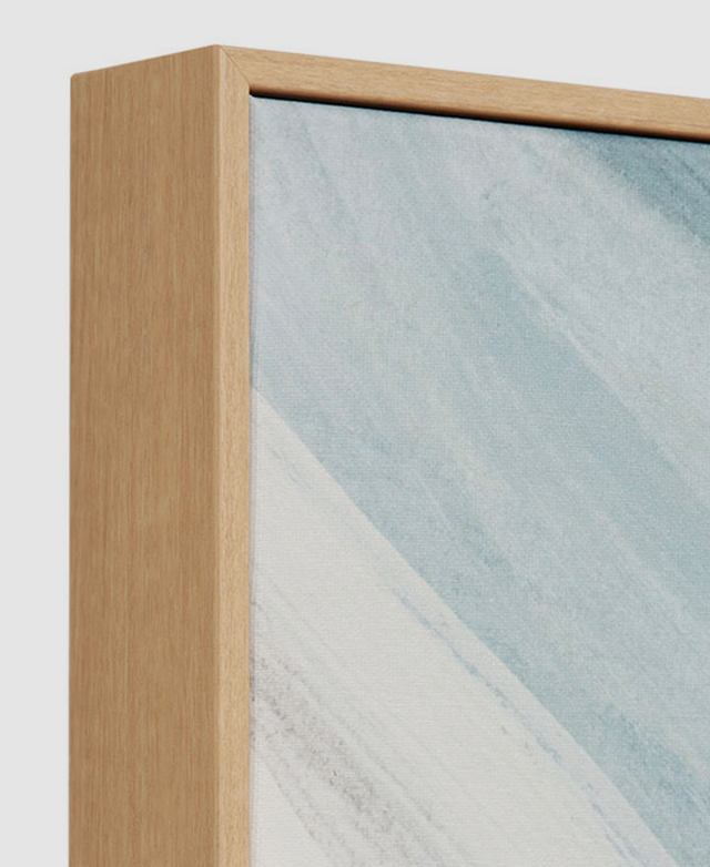 Detailed view of the wood-look polystyrene frame showcases the grain effect and smooth finish. Detailed view of the wood-look polystyrene frame showcases the grain effect and smooth finish.