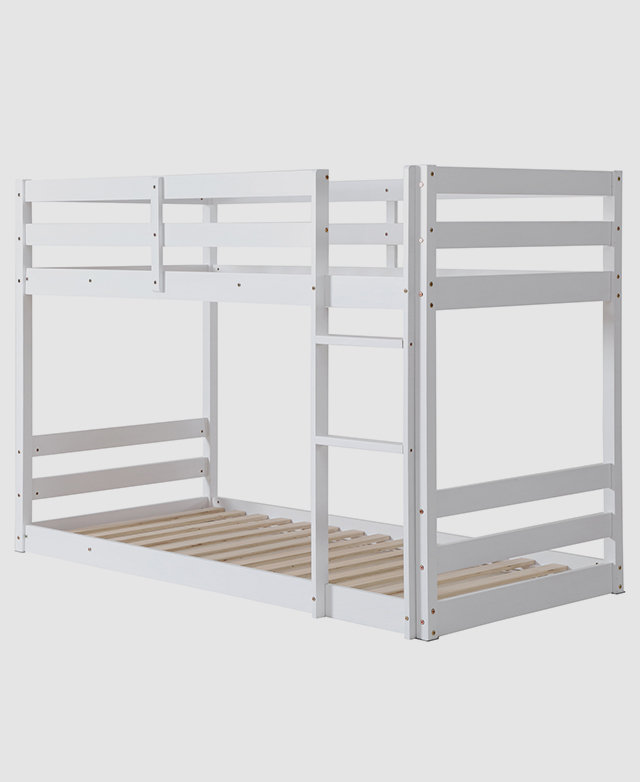 The fully assembled simple white bunk bed is presented without mattresses and bedding. The fully assembled simple white bunk bed is presented without mattresses and bedding.