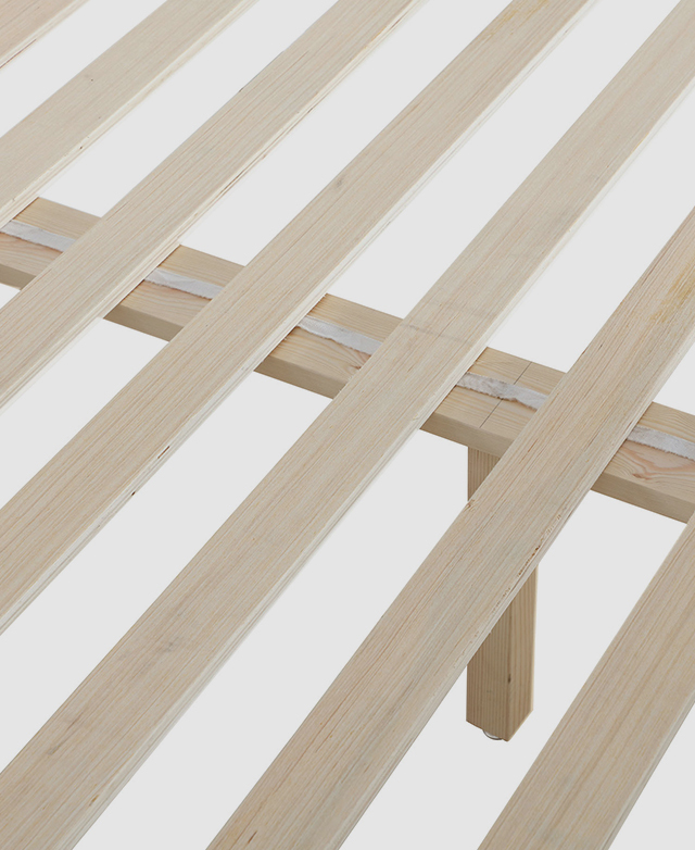 Close bird's eye view of a pine wood slatted base. Close bird's eye view of a pine wood slatted base.