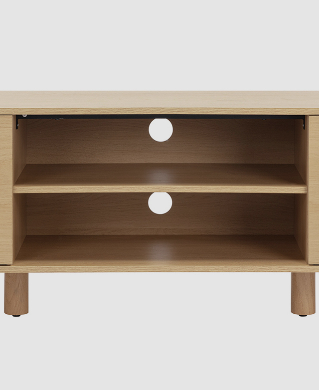 The two central open shelves are shown front-on to frame the two cable holes in the back surface. The two central open shelves are shown front-on to frame the two cable holes in the back surface.