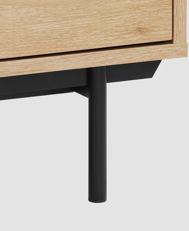 Crisp, black cylindrical metal leg and frame support are in focus.
