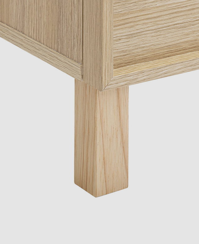 One angular rubberwood leg is exhibited.
