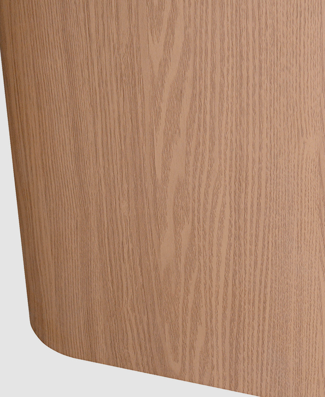 Side view of the bedside table shows the wood grain effect on the surfaces. Side view of the bedside table shows the wood grain effect on the surfaces.