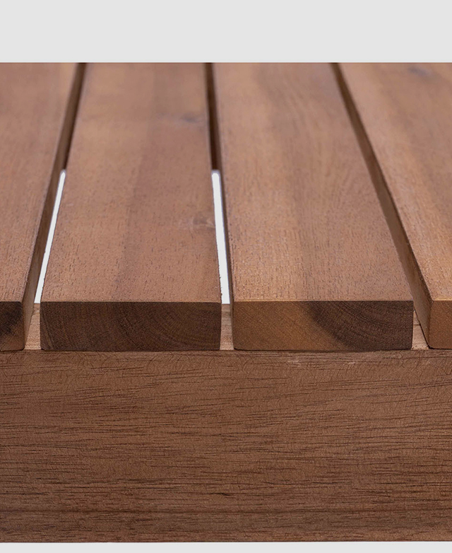 Crisp, evenly placed timber slatting forms the bench's seat.