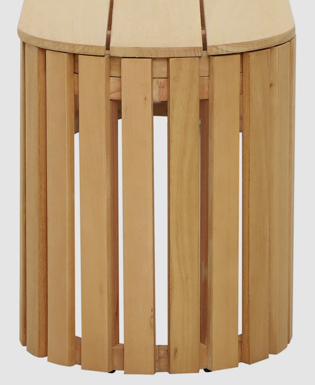 One end of the bench is in the frame to draw attention to the blonde wood slatting. One end of the bench is in the frame to draw attention to the blonde wood slatting.