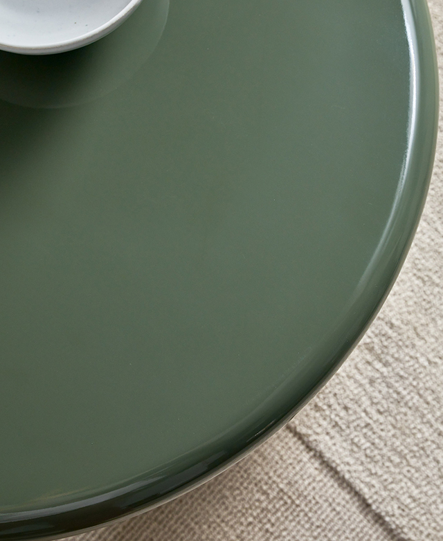 Bird's eye view of a green table indicates the high-shine finish Bird's eye view of a green table indicates the high-shine finish