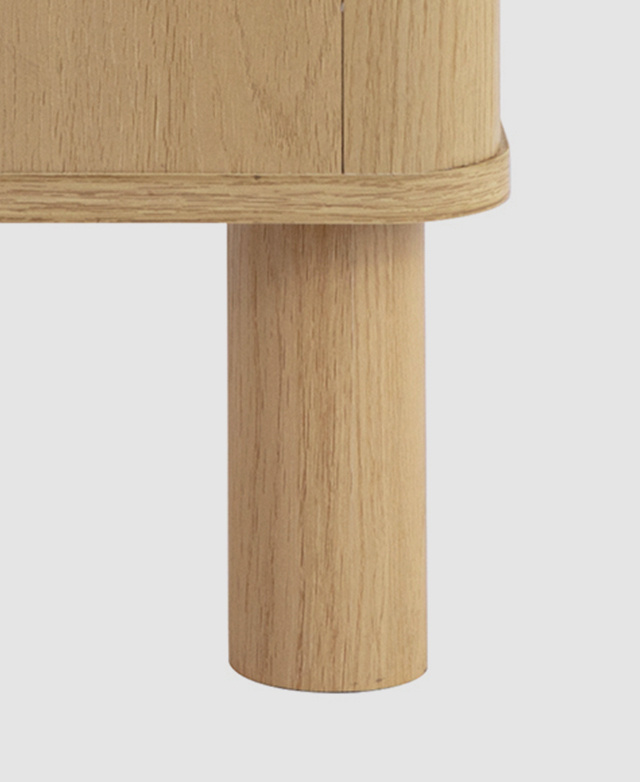Close up of a thick, cylindrical pine wood leg. Close up of a thick, cylindrical pine wood leg.