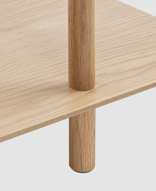 A close up of one of the oak wood legs illuminates its warm colour and natural grains. A close up of one of the oak wood legs illuminates its warm colour and natural grains.