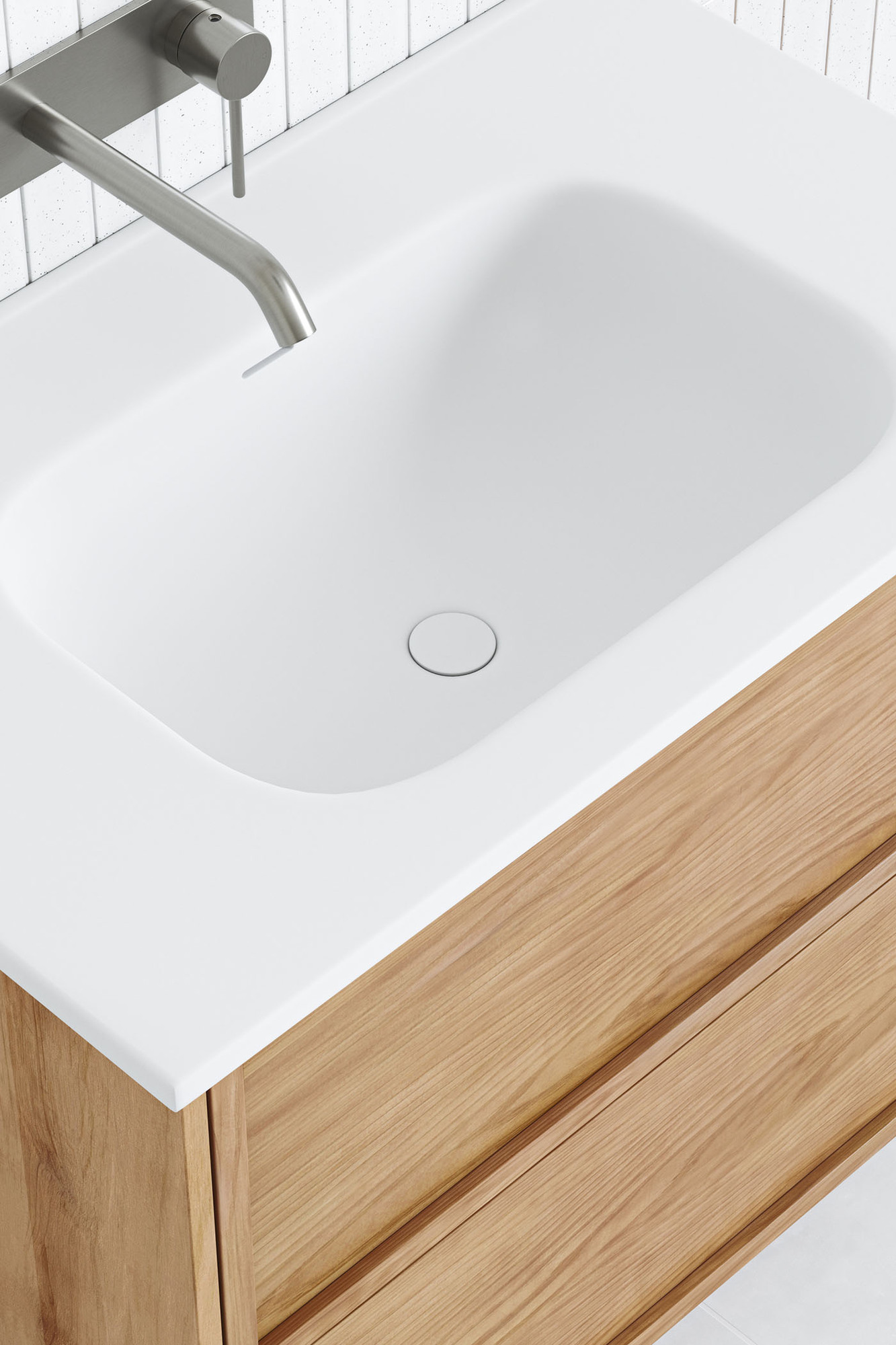 The top-down angle highlights the smooth integration of the soft rectangular sink within the vanity top, all in crisp white. The top-down angle highlights the smooth integration of the soft rectangular sink within the vanity top, all in crisp white.