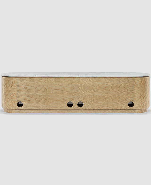 The back surface of the TV unit depicts the vein patterning of the veneer, and highlights the four cable holes.
