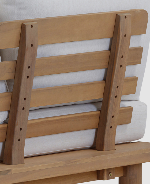 A back view of the seat highlights the slatted structure of the acacia wood frame.