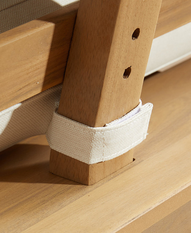 The cushion straps have Velcro ends, which are fixed together around a backrest pillar.