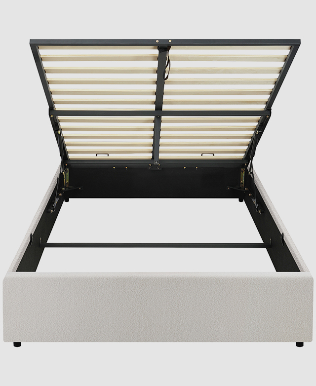 The slatted base is lifted to reveal storage space within the bed frame. The slatted base is lifted to reveal storage space within the bed frame.
