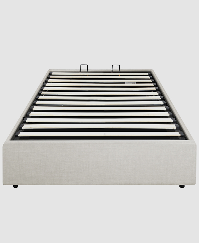 An angled bird's eye view displays the evenly-spaced plywood slatting and black metal support structures. An angled bird's eye view displays the evenly-spaced plywood slatting and black metal support structures.