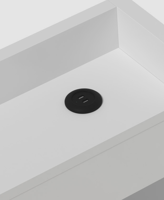 The white shelf along the bedhead features a USB port for charging two items - like your phone and e-reader - at a time.