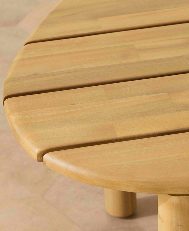 The smoothly-finished surfaces and edges of the wooden slats enhance the oval shape.