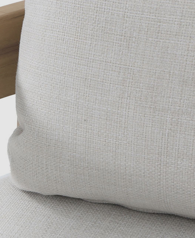 Off-white, woven Olefin upholstery is shown up close. Off-white, woven Olefin upholstery is shown up close.