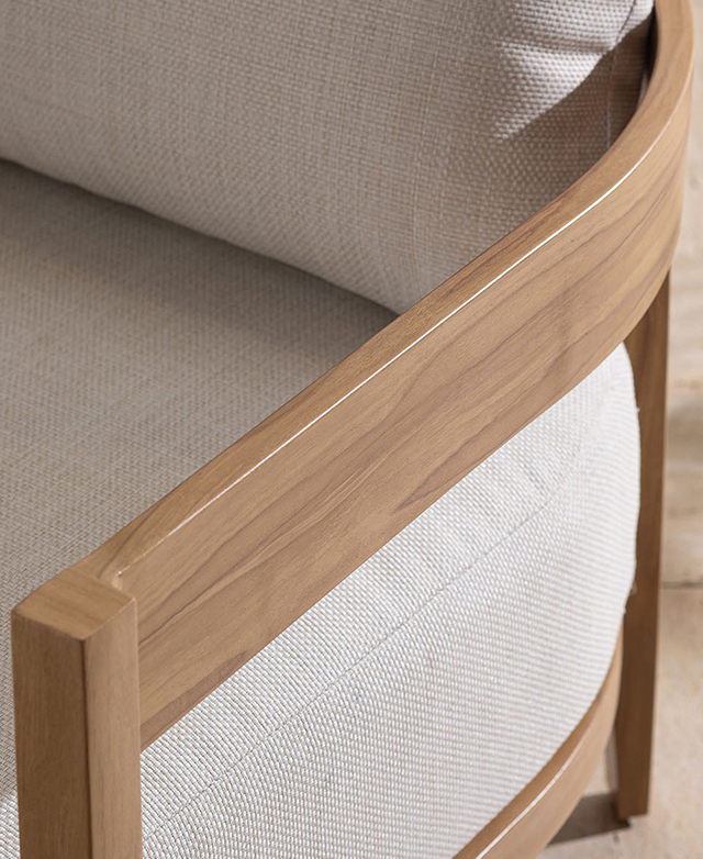 The smooth, gently curved metal armrest looks like timber. The smooth, gently curved metal armrest looks like timber.