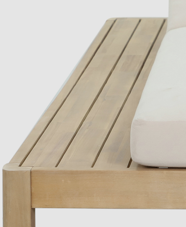 The narrow slatted side table is built into the sun lounger.