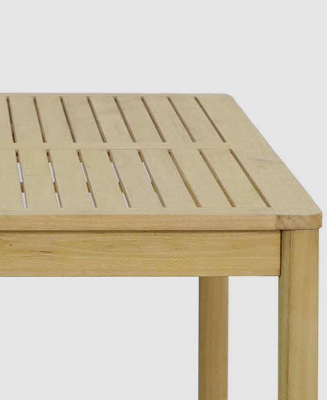 Cropped view highlights the narrow gaps between the wooden slatted table surface. Cropped view highlights the narrow gaps between the wooden slatted table surface.