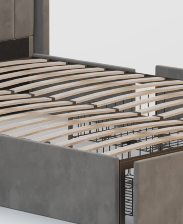 The fully assembled grey bed is without a mattress, thus displaying the flexible slatting and metal frame elements.
